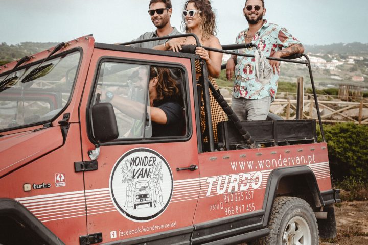 a person riding on the back of a truck