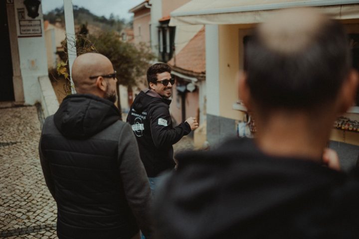 a man and a woman standing in front of a crowd