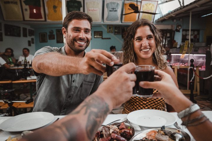 a man holding a plate of food