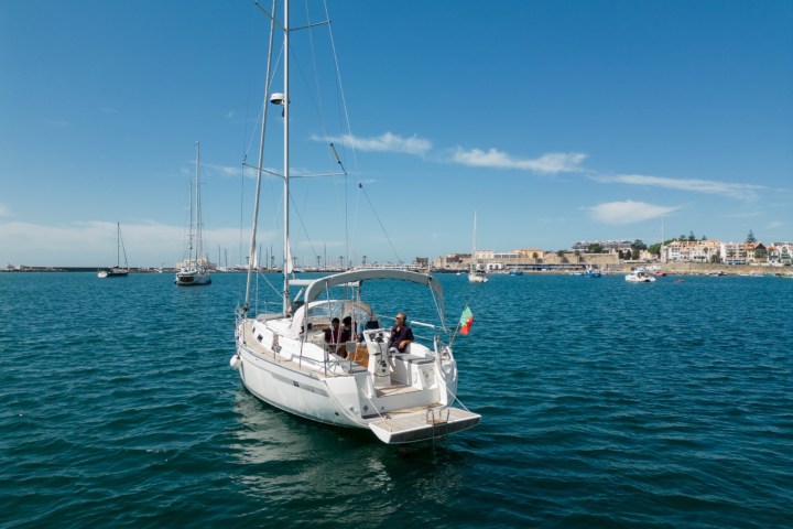 a small boat in a large body of water